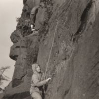 Bernard Wright on Pedestal Route (foreground) at the Roaches in January 1958 (Unknown)