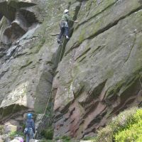Dave Wyley reaches the first gear placement on Jeffcoats Chimney (Roger Dyke)