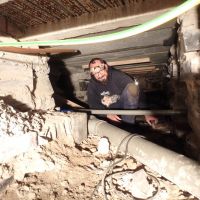 Andy in the underworld (plumbing in dehumidifier overflow pipe) (Dave Shotton)