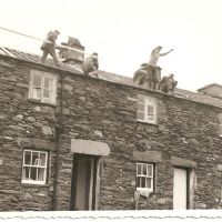 "Plus ca change" - what were the KMC doing 50 years ago in April 1963. Well fixing the roof, Irish Row in them days.... (Unknown)