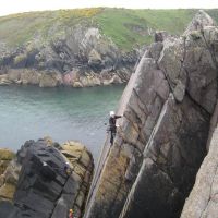 Dave leading Diagonal Crack, Porth Clais (Roger Dyke)
