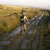 Cycling over stones (Dave Dillon)