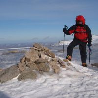 Bob Kelly on summit of Carn a Choire Bhoidheach (Gareth Williams)