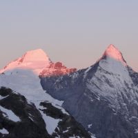Early morning Alpine glow on the Schreckhorn (left) and Eiger (Andy Stratford)