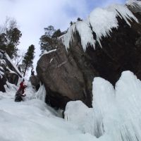 Spectacular ice formations at the top (P4) of Tjonnstadbergfossen, Dave & Al in view (Andy Stratford)