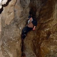 Dave scrambling down in the cave (Dave Wylie)