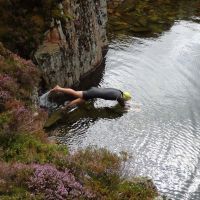 Mark diving into the quarry pool (Dave Wylie)