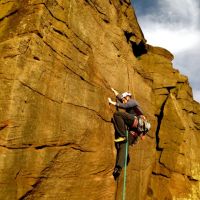 Dan on the starting slopers of the ultra-classic Scoop Face HVS 5a (Simon Robertshaw)