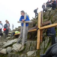 Snowdon.  Everyman and his dog.  And the crosses..... (Roger Dyke)