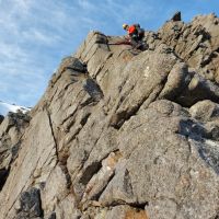 Andy Pierce on Afterthought Arete (mod), Stag Rocks on an unseasonably warm day (Andy Stratford)