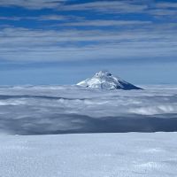 Cotopaxi puffing in the inversion - seen from Antisana