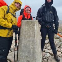 Andy L, Lucie and Lewis at Ben Macdui’s trig pillar (Gareth Williams)