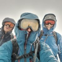 Josh, Andy and Jess B in more typical Scottish conditions on top