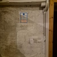 Repositioned double USB socket in lower left